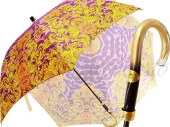 Ombrello con fantasia leopardata fucsia e corone dorate